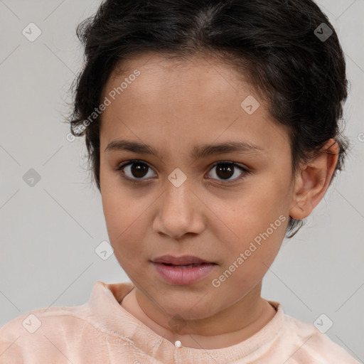 Joyful white child female with short  brown hair and brown eyes