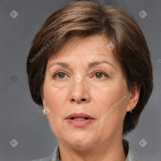 Joyful white adult female with medium  brown hair and brown eyes