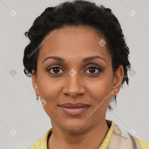 Joyful latino adult female with short  brown hair and brown eyes