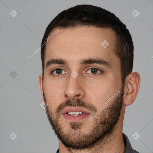 Neutral white young-adult male with short  black hair and brown eyes