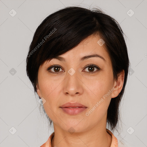 Joyful white young-adult female with medium  black hair and brown eyes