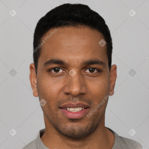 Joyful white young-adult male with short  black hair and brown eyes
