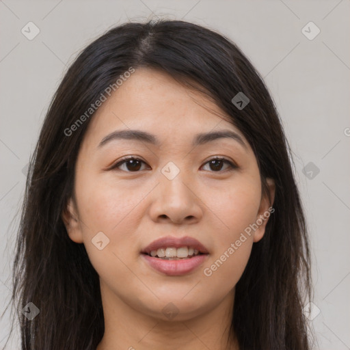 Joyful asian young-adult female with long  brown hair and brown eyes