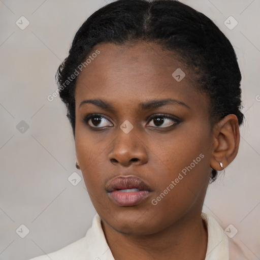 Neutral black young-adult female with short  black hair and brown eyes