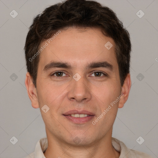 Joyful white young-adult male with short  brown hair and brown eyes