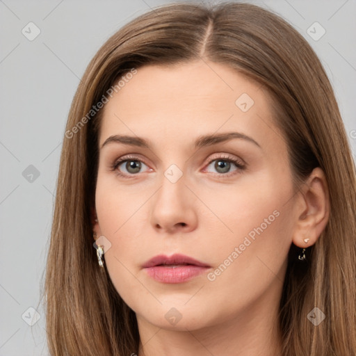 Neutral white young-adult female with long  brown hair and brown eyes