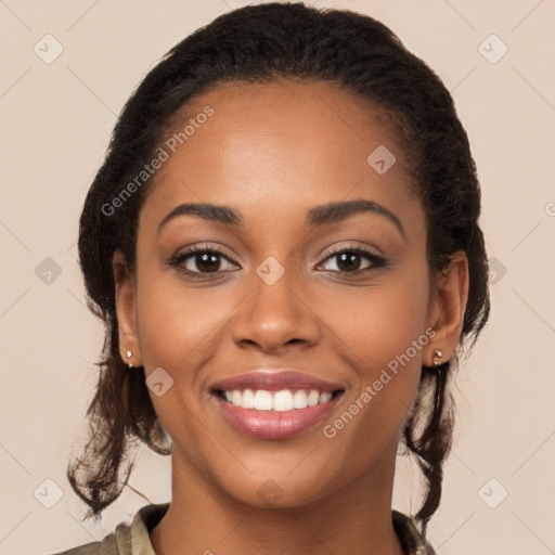 Joyful latino young-adult female with long  brown hair and brown eyes