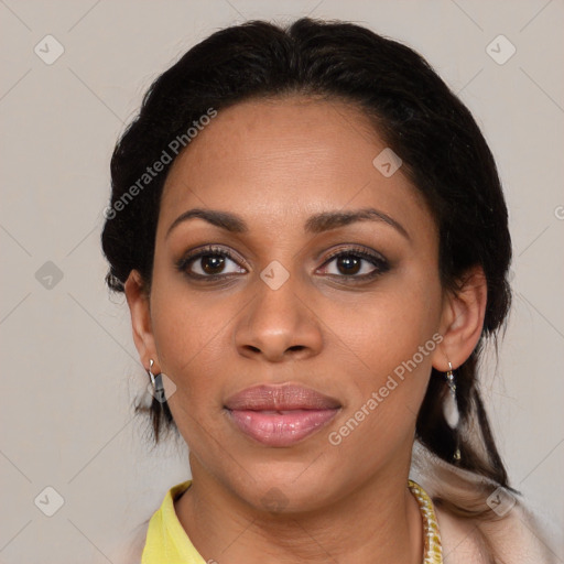 Joyful latino young-adult female with medium  brown hair and brown eyes