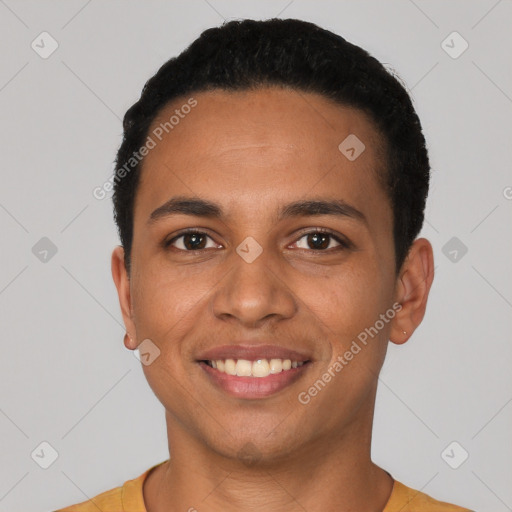 Joyful latino young-adult male with short  black hair and brown eyes