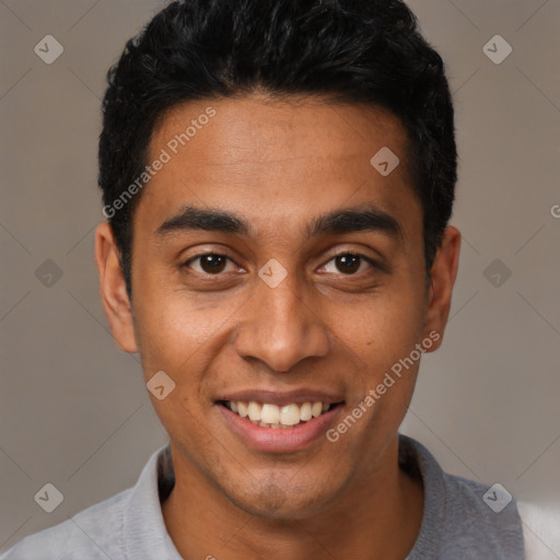 Joyful latino young-adult male with short  black hair and brown eyes