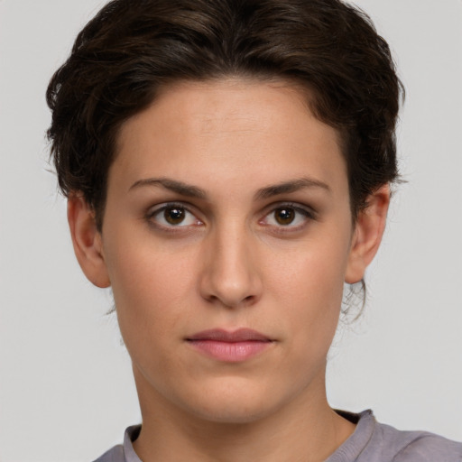 Neutral white young-adult female with short  brown hair and brown eyes