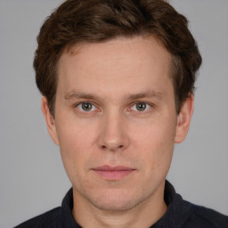 Neutral white adult male with short  brown hair and brown eyes