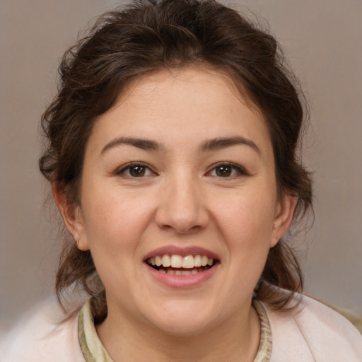 Joyful white young-adult female with medium  brown hair and brown eyes