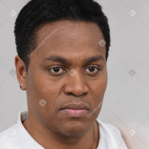 Neutral latino young-adult male with short  brown hair and brown eyes