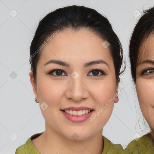 Joyful asian young-adult female with medium  brown hair and brown eyes