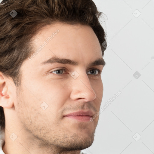 Neutral white young-adult male with short  brown hair and grey eyes