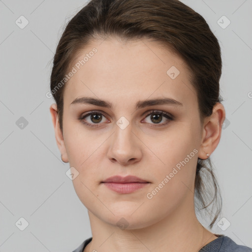 Neutral white young-adult female with short  brown hair and brown eyes