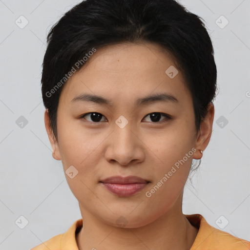 Joyful asian young-adult female with short  brown hair and brown eyes