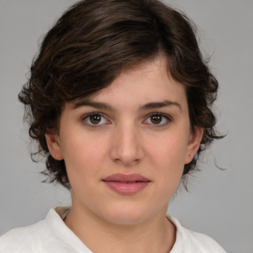 Neutral white young-adult female with medium  brown hair and brown eyes