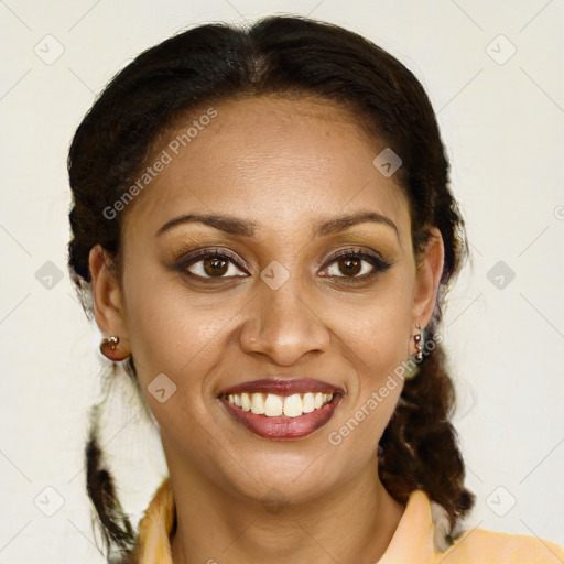 Joyful black young-adult female with medium  brown hair and brown eyes
