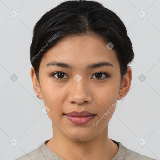 Joyful asian young-adult female with short  black hair and brown eyes