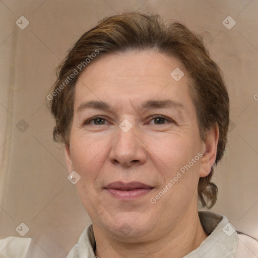 Joyful white adult female with short  brown hair and brown eyes