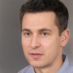 Neutral white adult male with short  brown hair and brown eyes