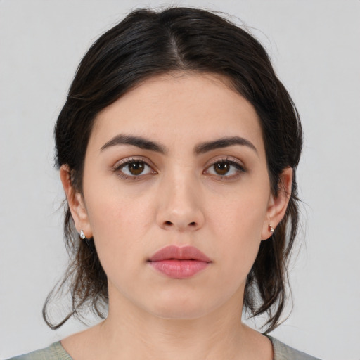 Neutral white young-adult female with medium  brown hair and brown eyes