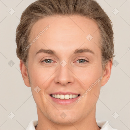 Joyful white adult female with short  brown hair and grey eyes