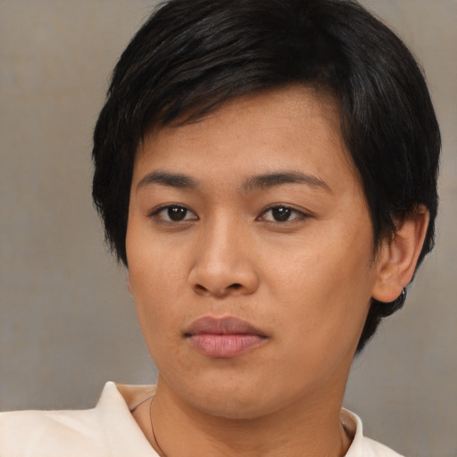 Neutral asian young-adult female with medium  black hair and brown eyes