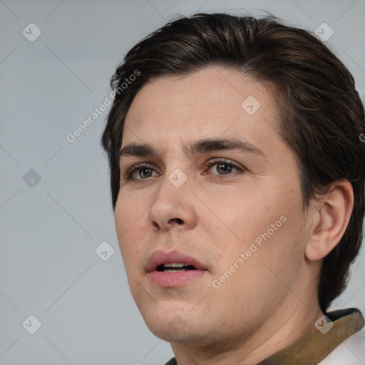 Neutral white young-adult male with short  brown hair and brown eyes