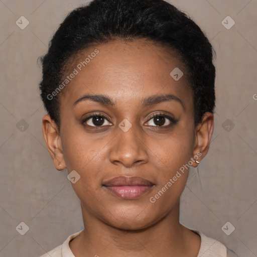 Joyful black young-adult female with short  brown hair and brown eyes