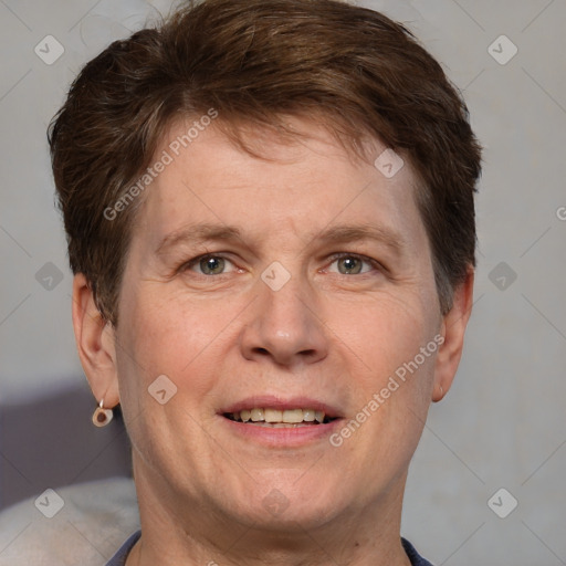 Joyful white adult male with short  brown hair and grey eyes