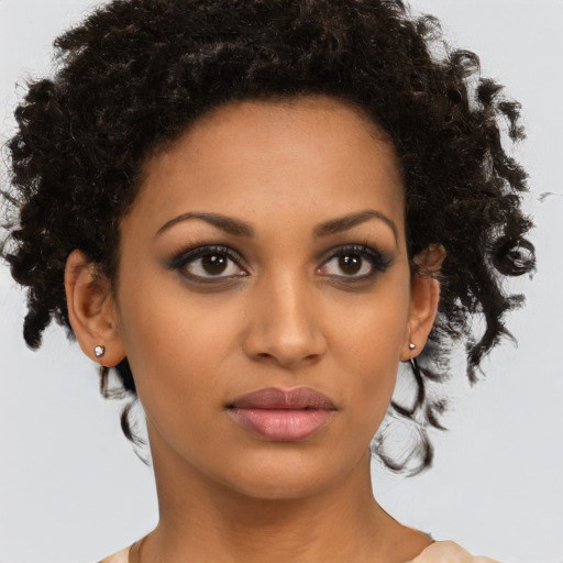 Neutral latino young-adult female with short  brown hair and brown eyes