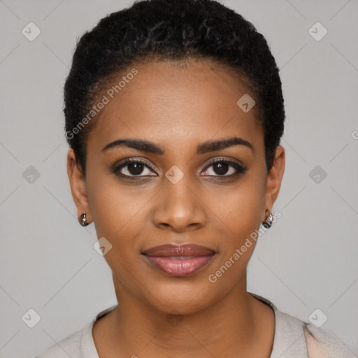 Joyful black young-adult female with short  black hair and brown eyes