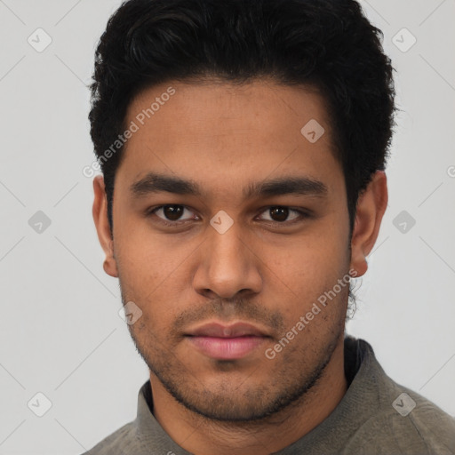 Neutral latino young-adult male with short  black hair and brown eyes