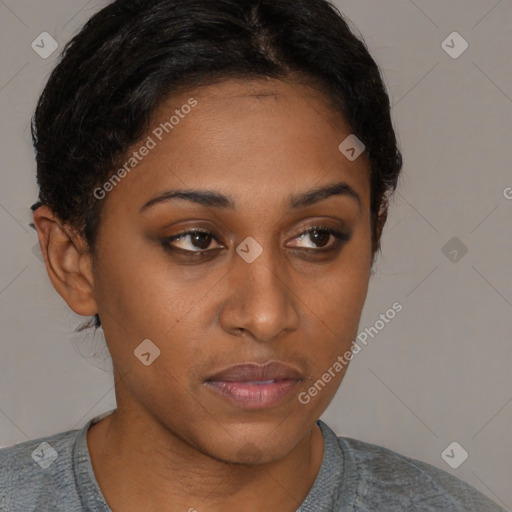 Neutral black young-adult female with short  brown hair and brown eyes