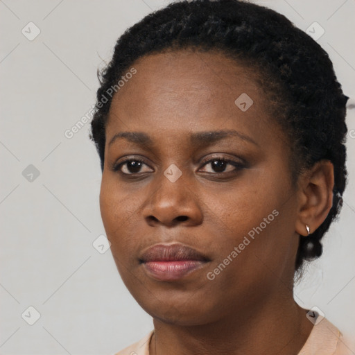 Neutral black young-adult female with short  black hair and brown eyes