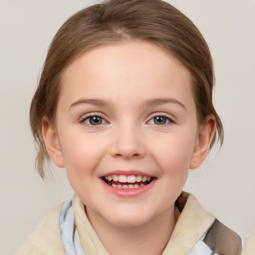 Joyful white child female with medium  brown hair and blue eyes