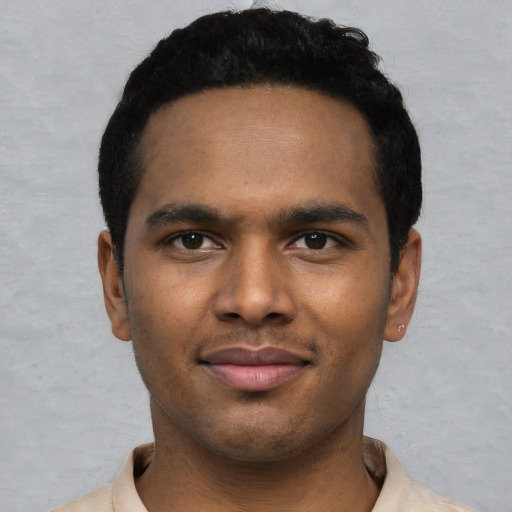Neutral black young-adult male with short  black hair and brown eyes