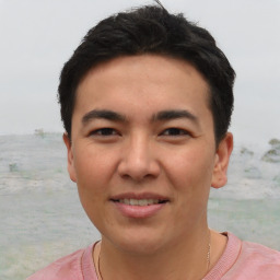 Joyful asian young-adult male with short  black hair and brown eyes