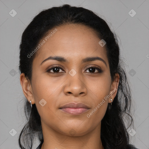 Joyful latino young-adult female with long  brown hair and brown eyes