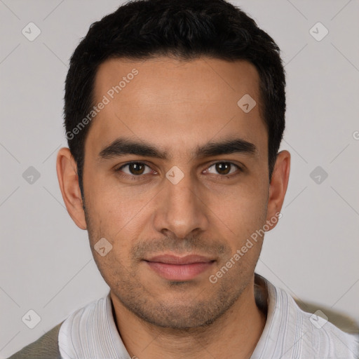 Joyful white young-adult male with short  black hair and brown eyes