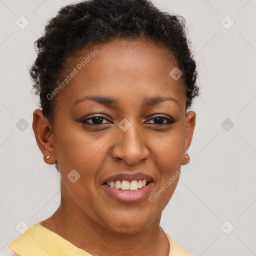 Joyful black young-adult female with short  brown hair and brown eyes