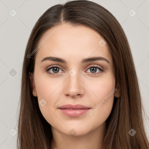 Neutral white young-adult female with long  brown hair and brown eyes