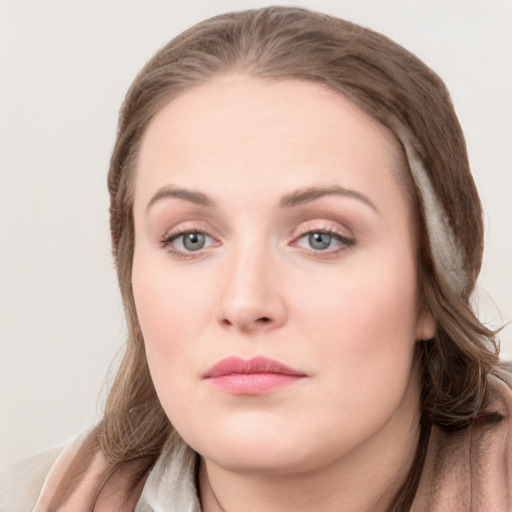 Neutral white young-adult female with long  brown hair and grey eyes