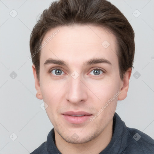 Neutral white young-adult male with short  brown hair and grey eyes