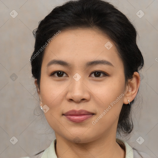 Joyful asian young-adult female with medium  brown hair and brown eyes