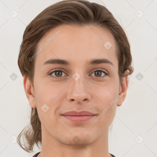 Joyful white young-adult female with short  brown hair and grey eyes