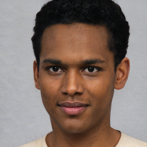 Neutral black young-adult male with short  black hair and brown eyes